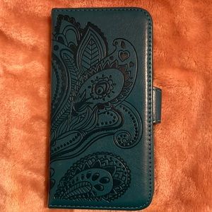 IPhone 7 Plus case magnet cover with credit card holders inside. Just like new.